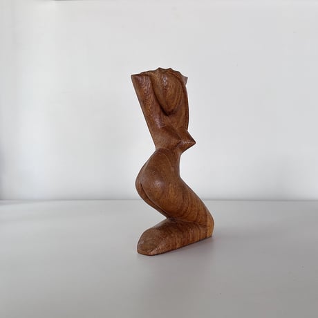 Object woman crouching
