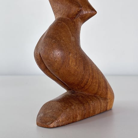 Object woman crouching