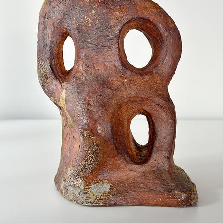 object crouching 70s