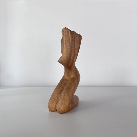 Object woman crouching