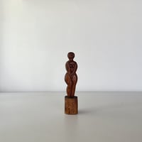 wood carved small woman 30s