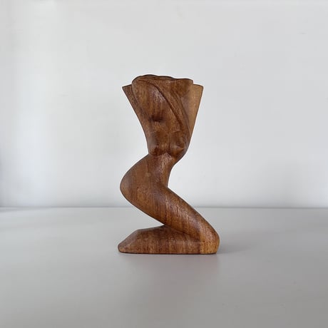 Object woman crouching