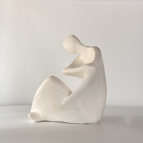 vintage object woman sitting kneel up 80s USA