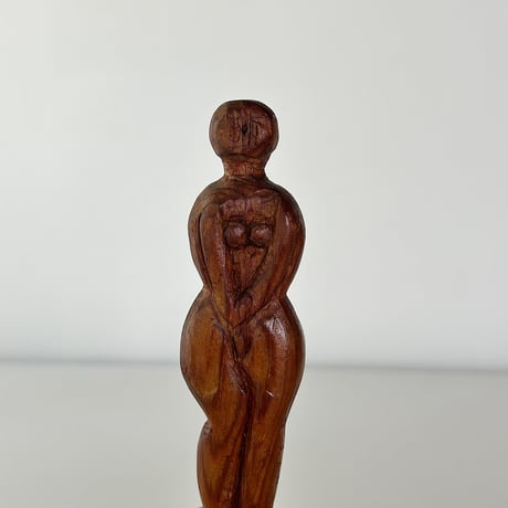 wood carved small woman 30s