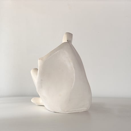 vintage object woman sitting kneel up 80s USA