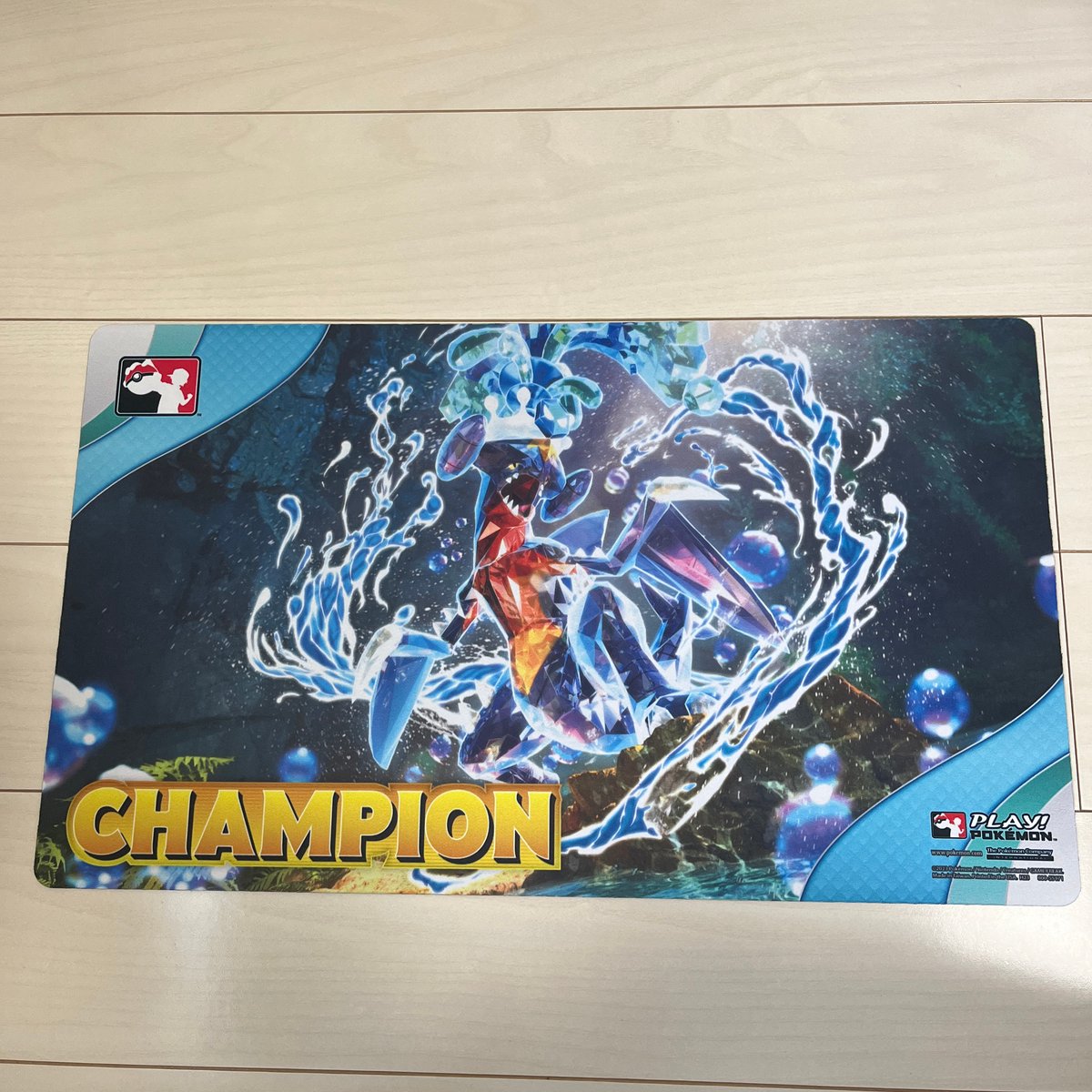 Play! Pokemon League Cup Champion Mat: Garchomp Play! Pokemon League Cup Champion Mat: Garchomp