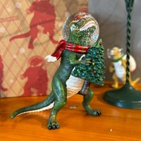 GLOBE DINOSAUR HOLD ON TREE