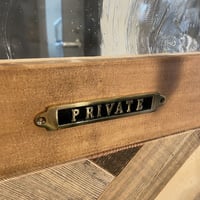 Brass sign