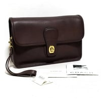 New Unused!  Vintage Coach 9832 Turnrock Clutch   Mahogany Glove Tanned Leather with Paper hangtag