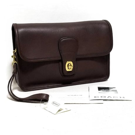 New Unused!  Vintage Coach 9832 Turnrock Clutch   Mahogany Glove Tanned Leather with Paper hangtag