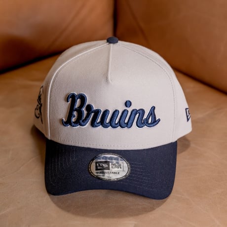 NEW ERA・ニューエラ　 9FORTY A-Frame UCLA Bruins ブルーインズ　ストーン × ネイビー スノーホワイト ネイビーバイザー