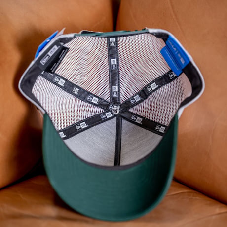 NEW ERA・ニューエラ　9FORTY A-Frame トラッカー UCLA LEAFロゴ（ダークグリーン/ホワイト）