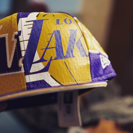 NEW ERA・ニューエラ　 9FIFTY OF LOSLAK JERSE OSFA YEL PUR　NBA　LAKERS・レイカーズ　八村塁