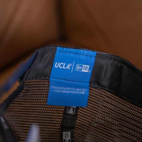 NEW ERA・ニューエラ　9FORTY A-Frame トラッカー UCLA スクリプトロゴ（クロームホワイト/ネイビー）