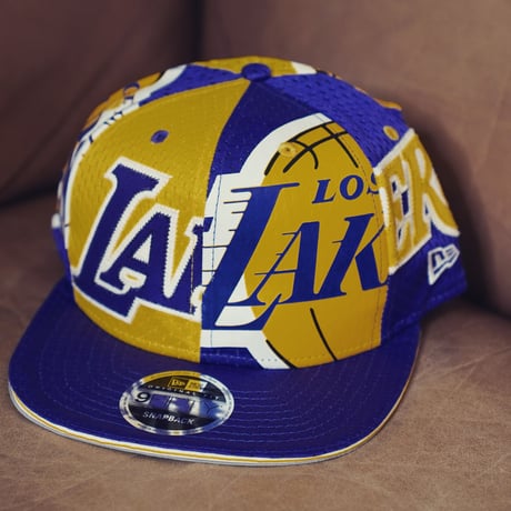 NEW ERA・ニューエラ　 9FIFTY OF LOSLAK JERSE OSFA YEL PUR　NBA　LAKERS・レイカーズ　八村塁