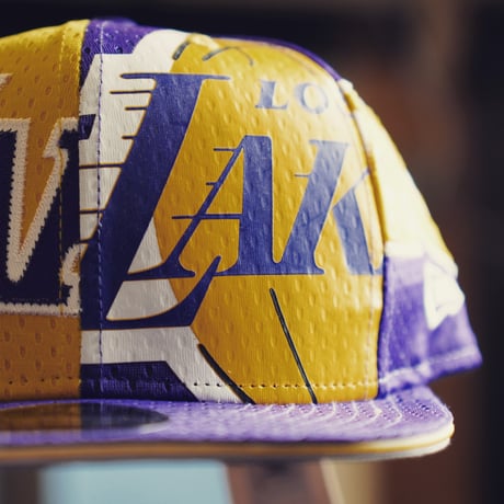 NEW ERA・ニューエラ　 9FIFTY OF LOSLAK JERSE OSFA YEL PUR　NBA　LAKERS・レイカーズ　八村塁