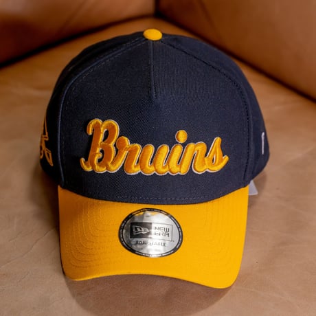 NEW ERA・ニューエラ　 9FORTY A-Frame UCLA Bruins ブルーインズ　ネイビー × メリットゴールド スノーホワイト Aゴールドバイザー