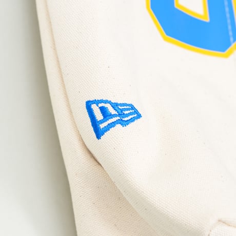 NEW ERA・ニューエラ　ユーティリティキャンバストート　14L　UCLA ナチュラル × マリンブルー メリットゴールド