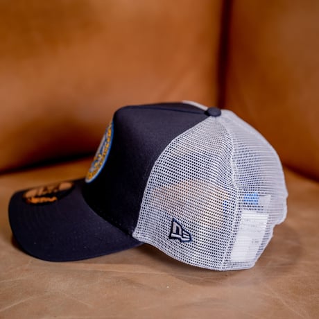 NEW ERA・ニューエラ　9FORTY A-Frame トラッカー UCLA CPSロゴ（ネイビー/ホワイト）