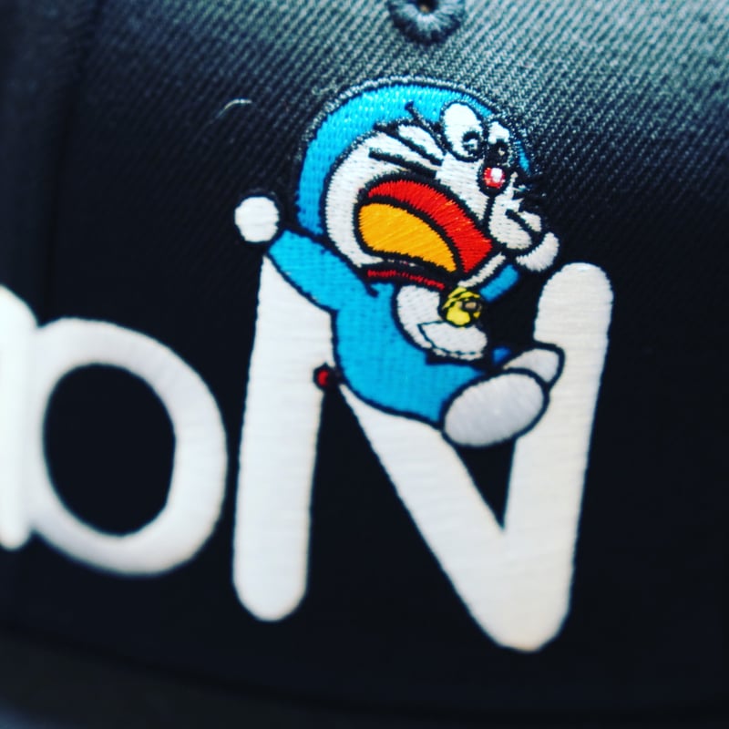 NEW ERA・ニューエラ 9FIFTY ドラえもん DORAEMON ブラック（M/L） |