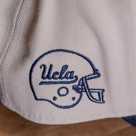 NEW ERA・ニューエラ　 9FORTY A-Frame UCLA Bruins ブルーインズ　ストーン × ネイビー スノーホワイト ネイビーバイザー