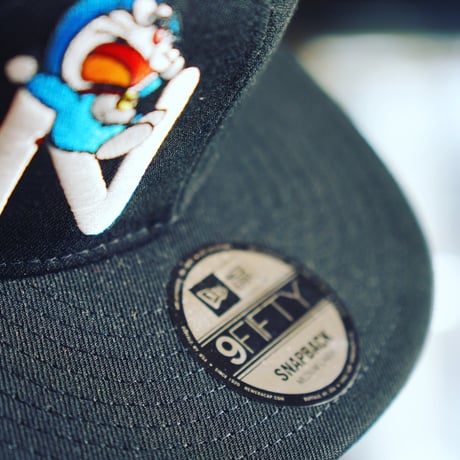 NEW ERA・ニューエラ　9FIFTY ドラえもん DORAEMON ブラック（M/L）
