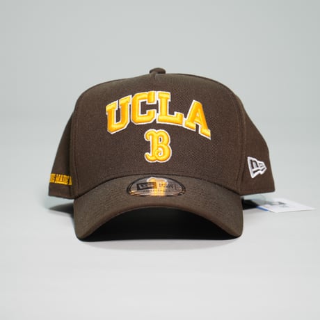 NEW ERA・ニューエラ　 9FORTY A-Frame UCLA アーチ Bロゴ ウォルナット × メリットゴールド スノーホワイト