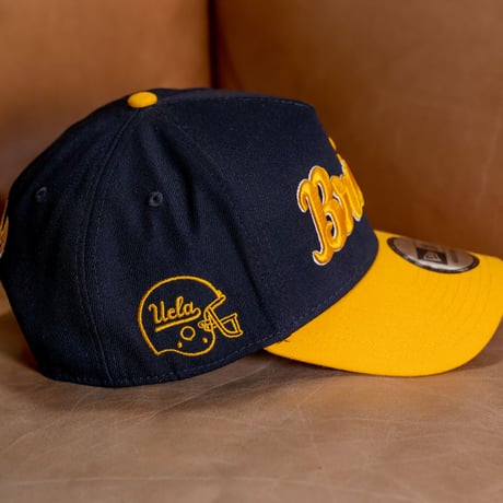NEW ERA・ニューエラ　 9FORTY A-Frame UCLA Bruins ブルーインズ　ネイビー × メリットゴールド スノーホワイト Aゴールドバイザー