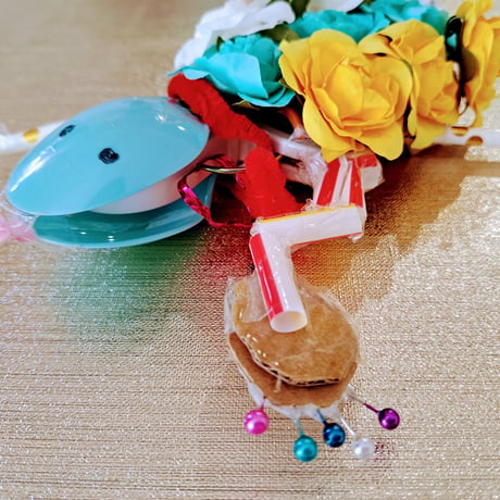 子ども作品：お花のトカちゃん（作：りつか）／支援者様のお手元にお届け