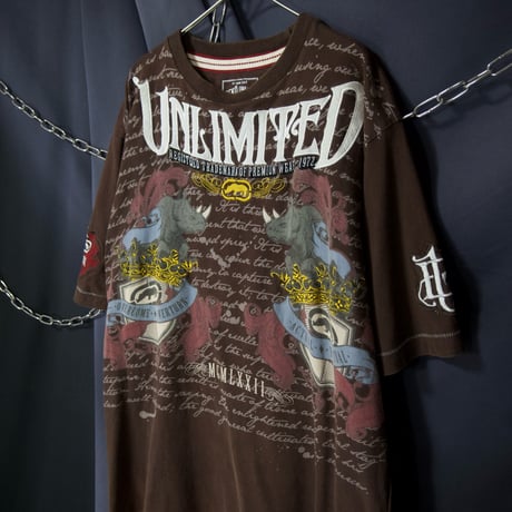 Ecko Unltd Stone Tablet Letters Tribal Lily Graphic Fraktur Embroidery “Single Stitches” S/S Tee