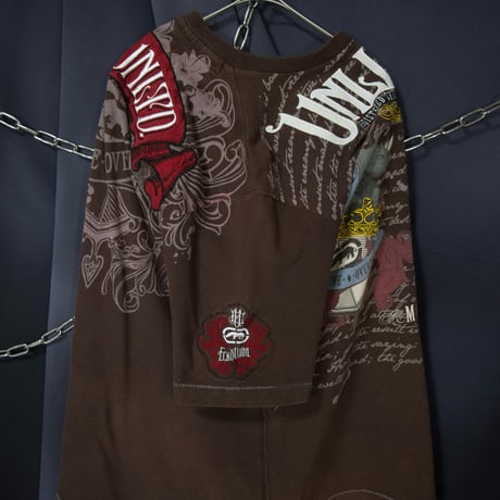 Ecko Unltd Stone Tablet Letters Tribal Lily Graphic Fraktur Embroidery “Single Stitches” S/S Tee