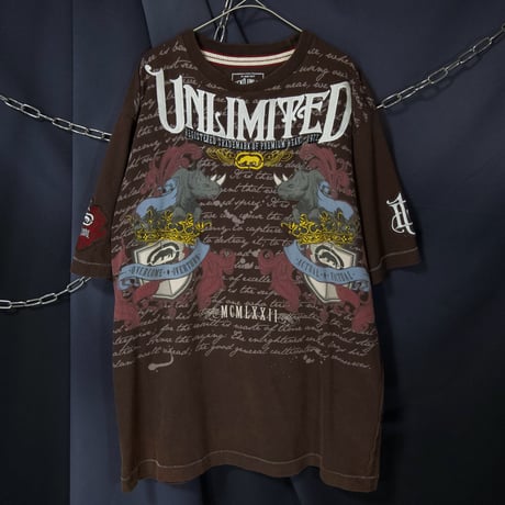 Ecko Unltd Stone Tablet Letters Tribal Lily Graphic Fraktur Embroidery “Single Stitches” S/S Tee