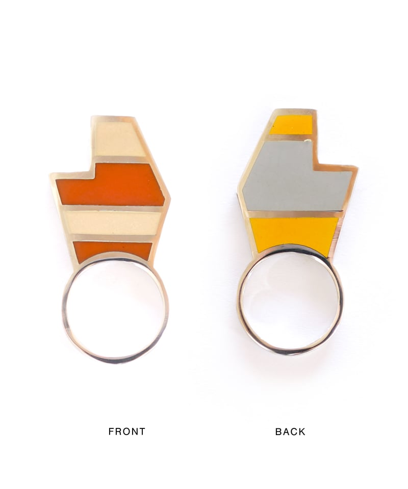 VOYAGE, a vertical and two faced enamel ring, V
