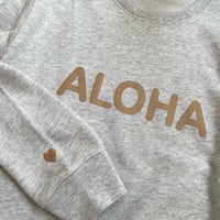 New ALOHA ♡キャメルロゴライトトレーナー