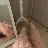 Pink far leg warmers