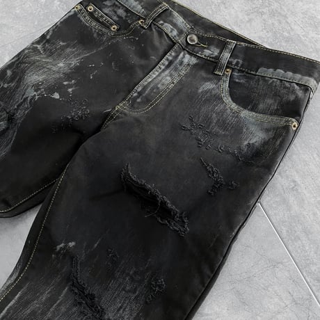 Shadow washed black destroyed skinny denim