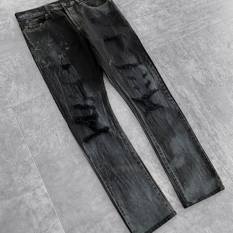 Shadow washed black destroyed skinny denim