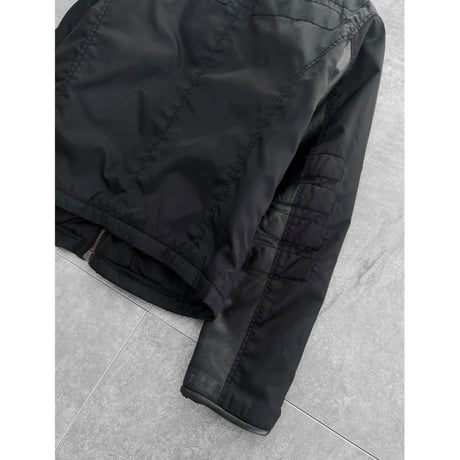"Panelled leather × Nylon" Puffer Jacket