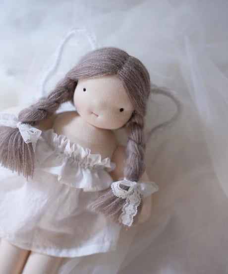 collaboration doll wing