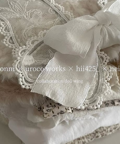 collaboration doll wing