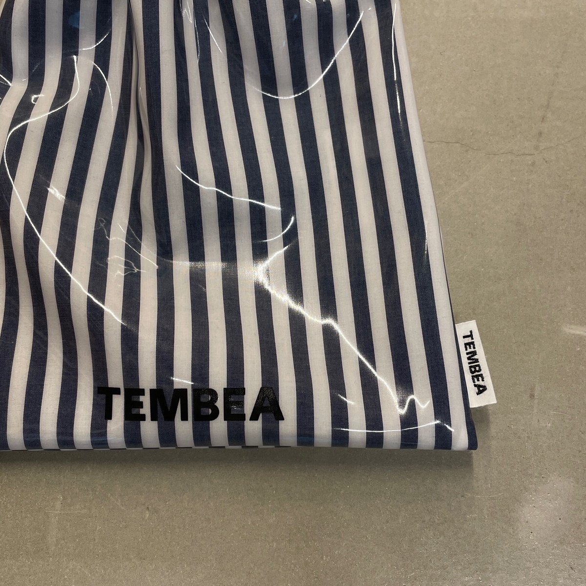 TEMBEA 巾着POCHETTE PVC COAT | niban STORE