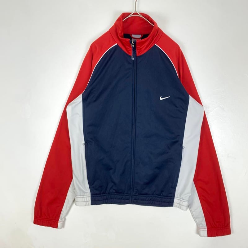 NIKE ナイロンジャージ 紺白赤 オーバー 限定 刺繍ロゴ ナイキ ストア