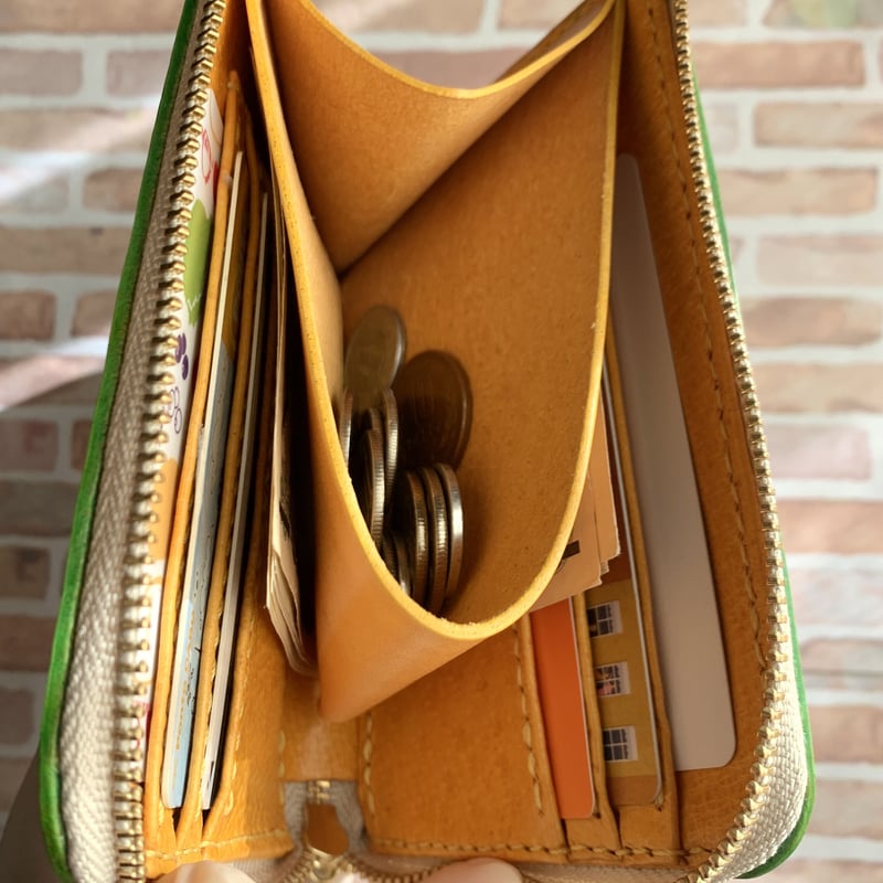 ラウンドファスナーロングウォレット ヌメ革ナチュラル アメ豚