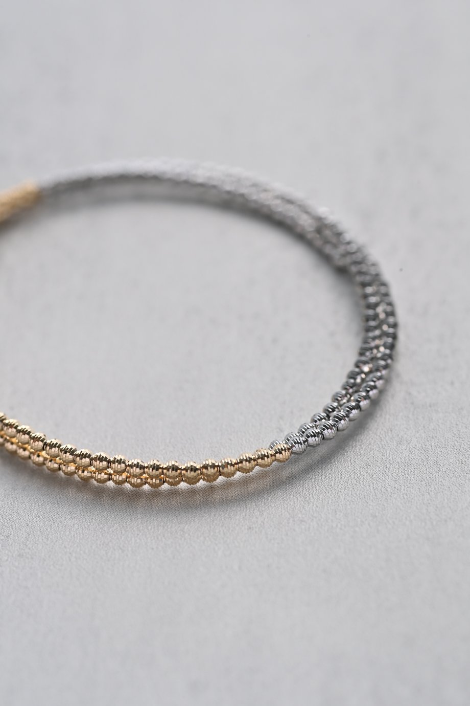 11/21-11/28予約販売＞K18YG/PT850 クリスタルカットバイカラー