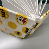 デカミニノッポ