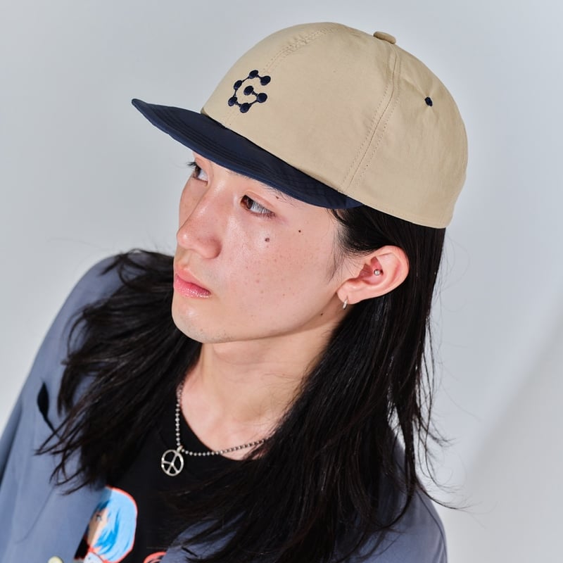 gm. Emb. Nylon Cap | globule mag.