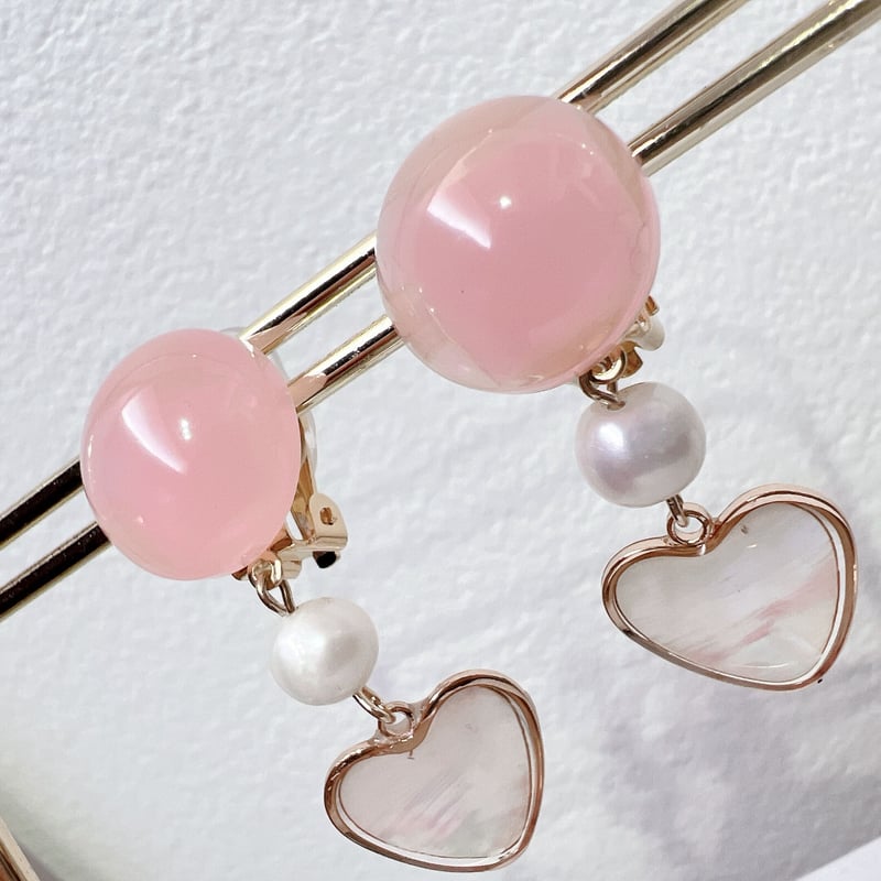 ピンクのハートシェルイヤリング・ピアス | peth handmade