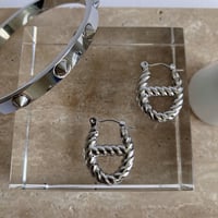 oval hoop pierce