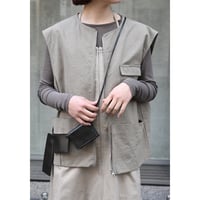 AMOMENTO “pocket vest”