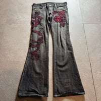 2000s TORNADO MART tribal flare denim pants